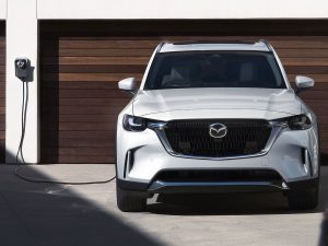 a white 2024 Mazda CX-90 PHEV charging | Vancouver, WA