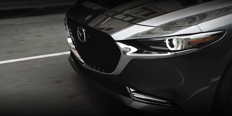 sleek 2024 Mazda3 Sedan hood and headlights